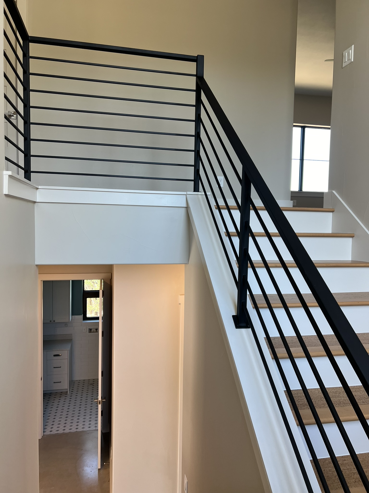 Sculptural staircase in a custom home